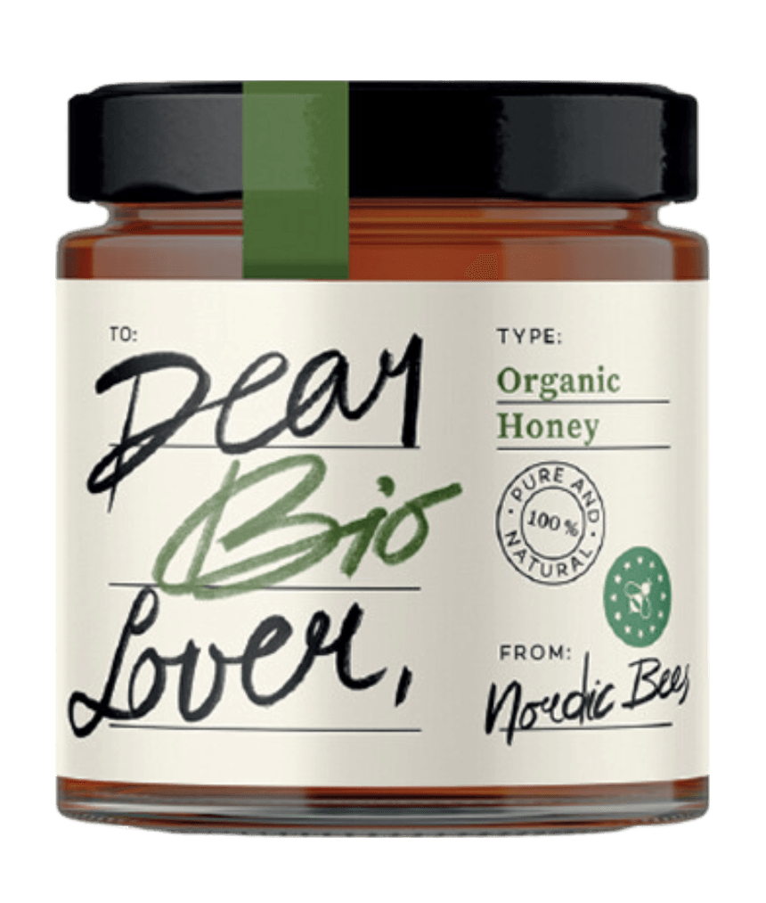 Jar of Dear Bio Lover organic honey from Nordic Bees with a dark brown cap stripe